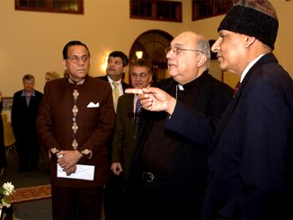 In photo, Zia Rahman, right, points out features of the Muslim mosque in Voorhees to Most Rev. Bishop Joseph Galante, of the Roman Catholic Diocese of Camden.