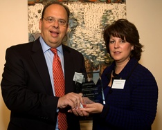 Lou Grossman, APR, accepts the Anthony Fulginiti Education Award from Maribeth Roman Schmidt at the 2009 PRSA/Philadelphia Pepperpot Awards